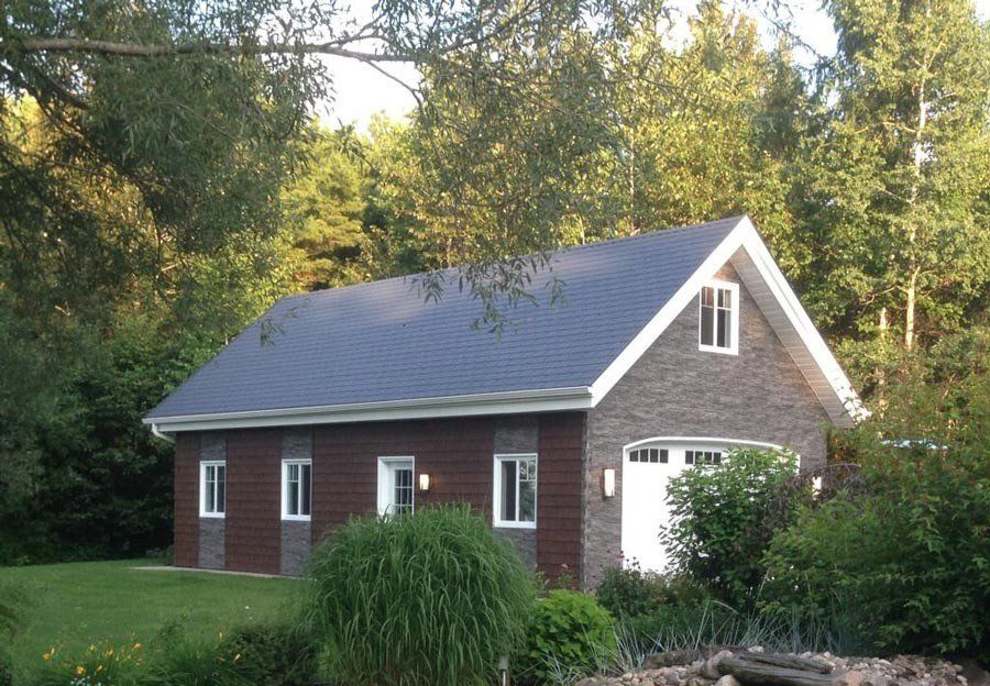 Landhaus mit einer Teilfassade in NoviStone DS lava