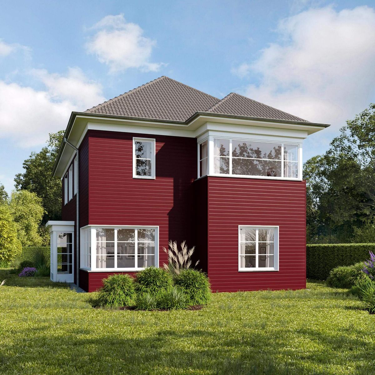 Freistehendes Landhaus mit einer wartungsfreien Kunststofffassade VinyPlus in der Farbe Rot.